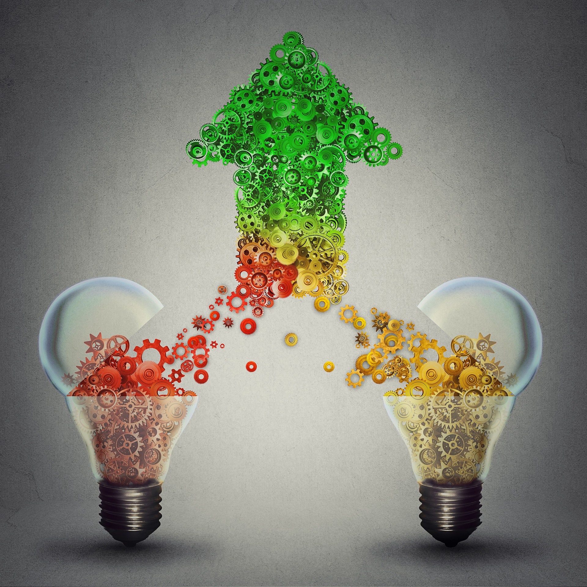Creative innovation success as two open glass light bulbs releasing gears cogs coming together in the shape of upward arrow symbol